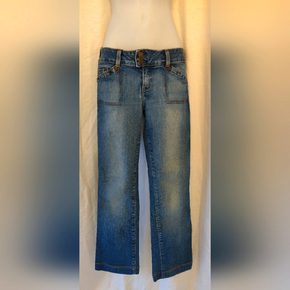 GUESS stretch denim, low rise, boot cut jeans in light, slightly distressed wash